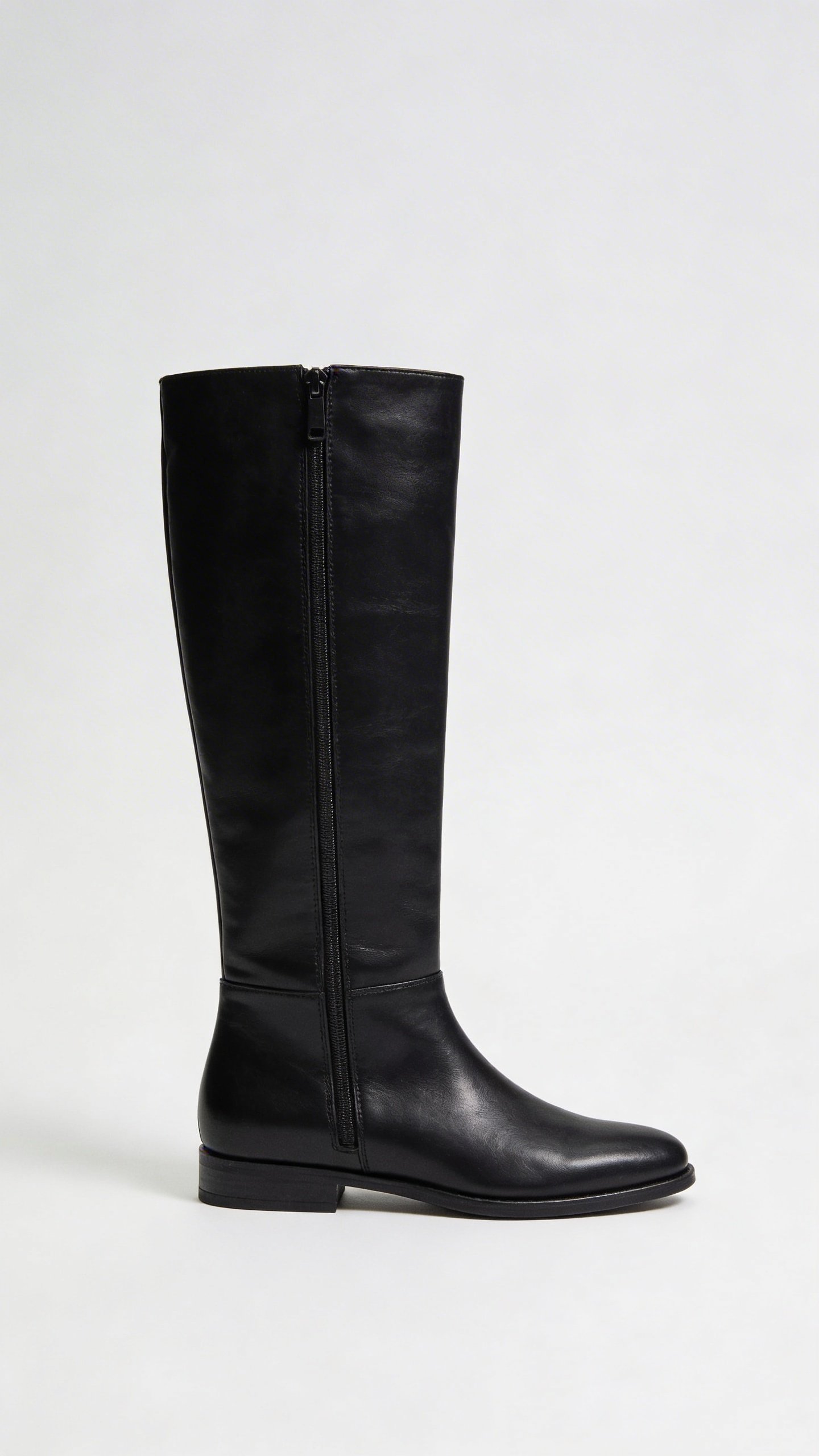 Single pair of black leather mid calf boots