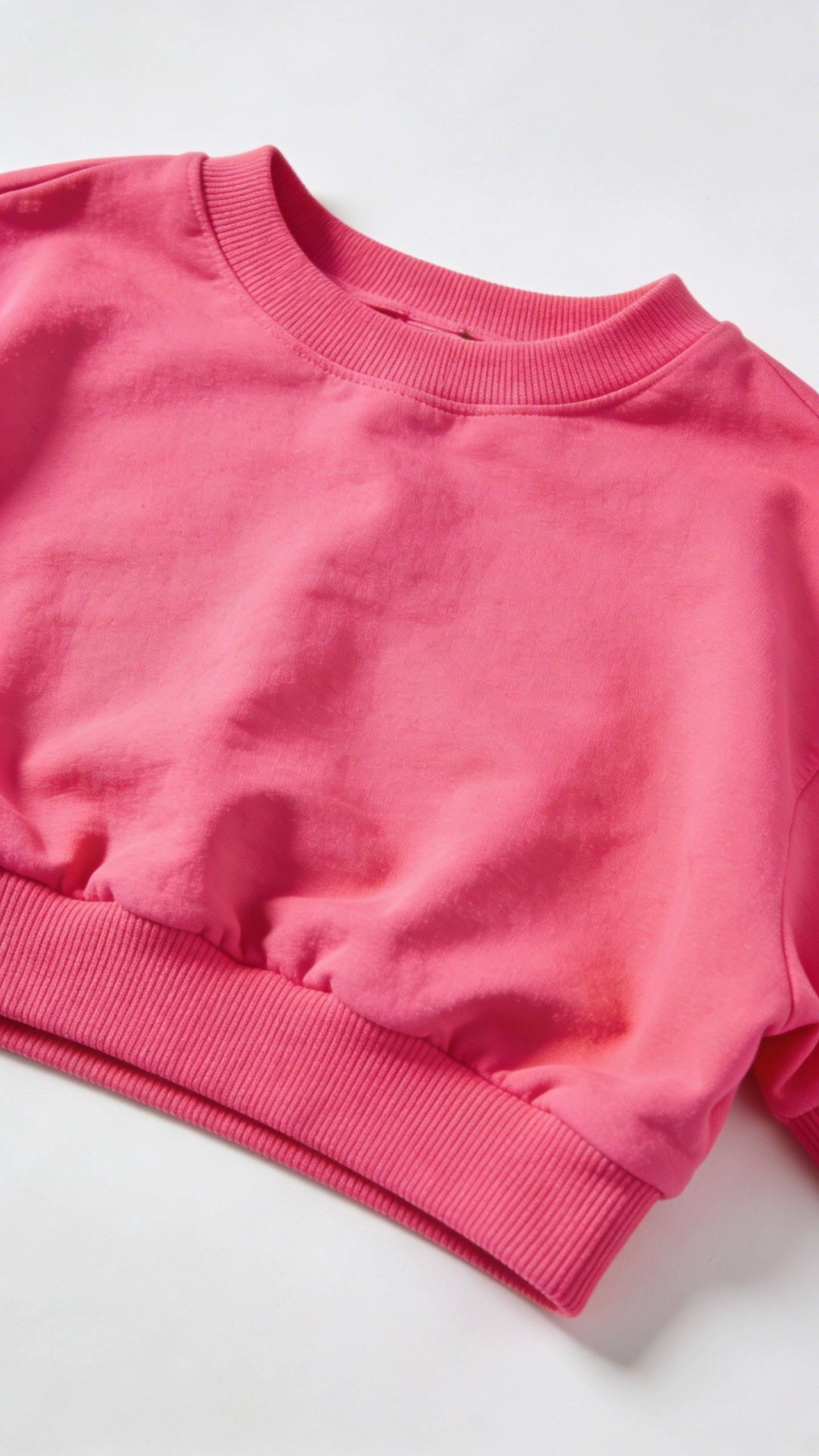 Pink streetwear crop top on white background
