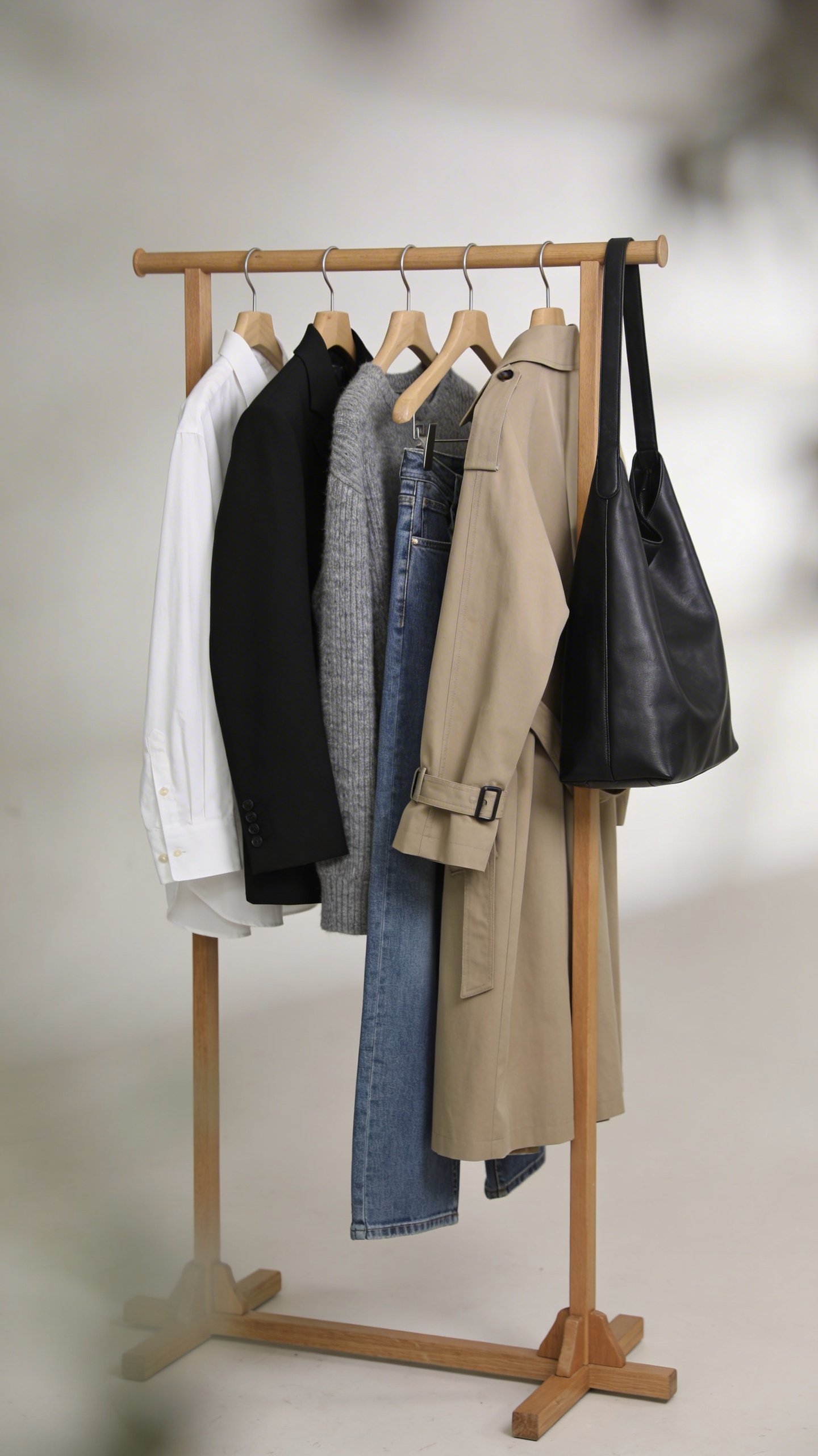 Minimalist capsule wardrobe on single clothing rack