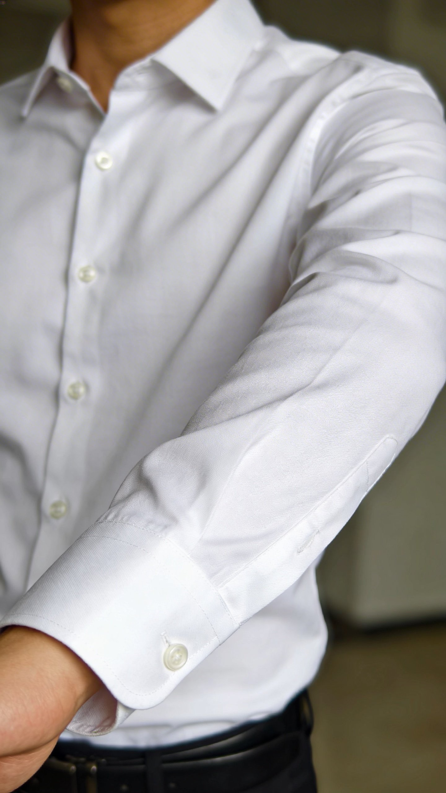 Perfect sleeve length on crisp white dress shirt