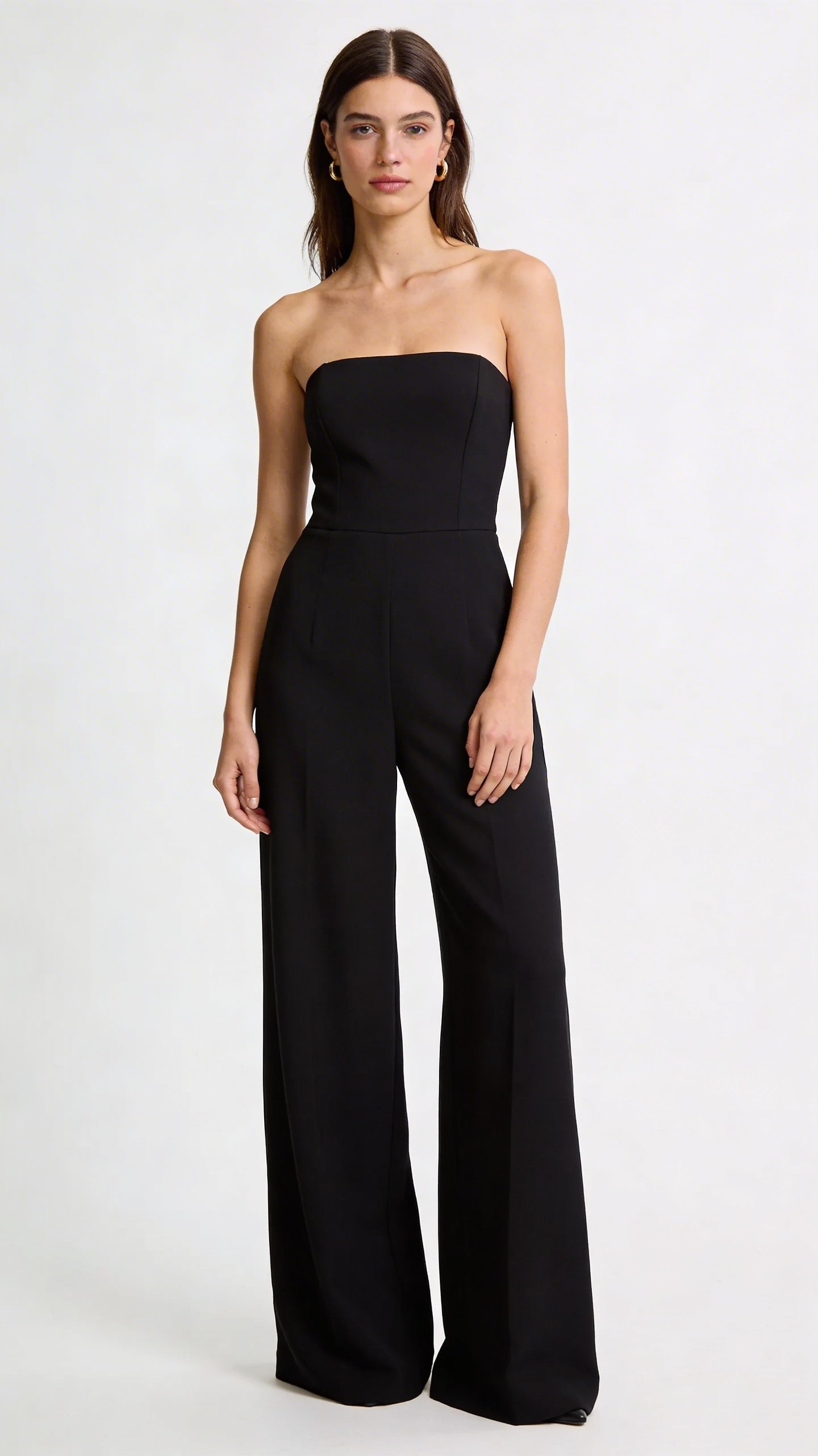 Elegant black wide-leg jumpsuit on model, full-length shot