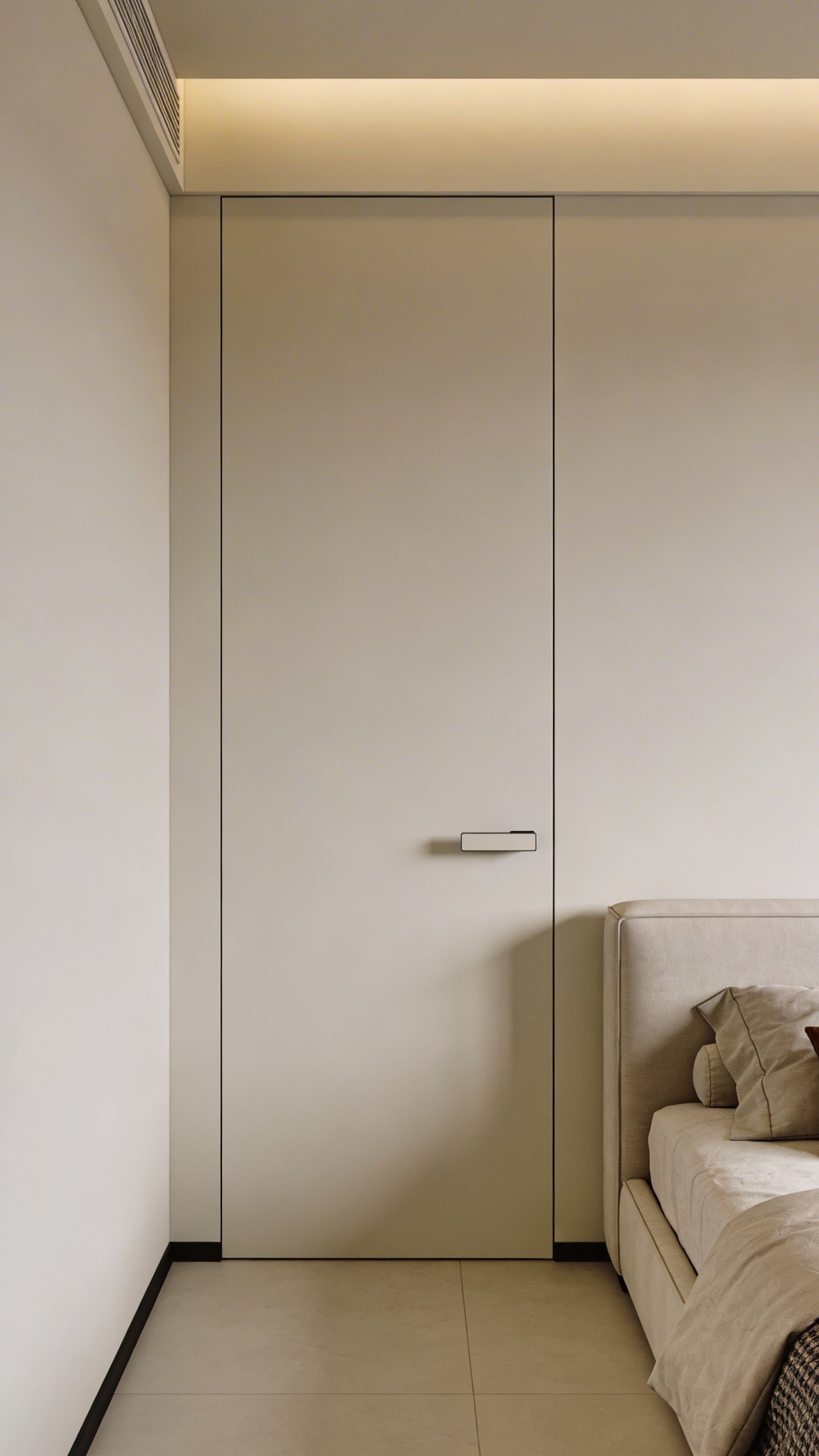 Minimalist bedroom wall with hidden flush-mount door panel