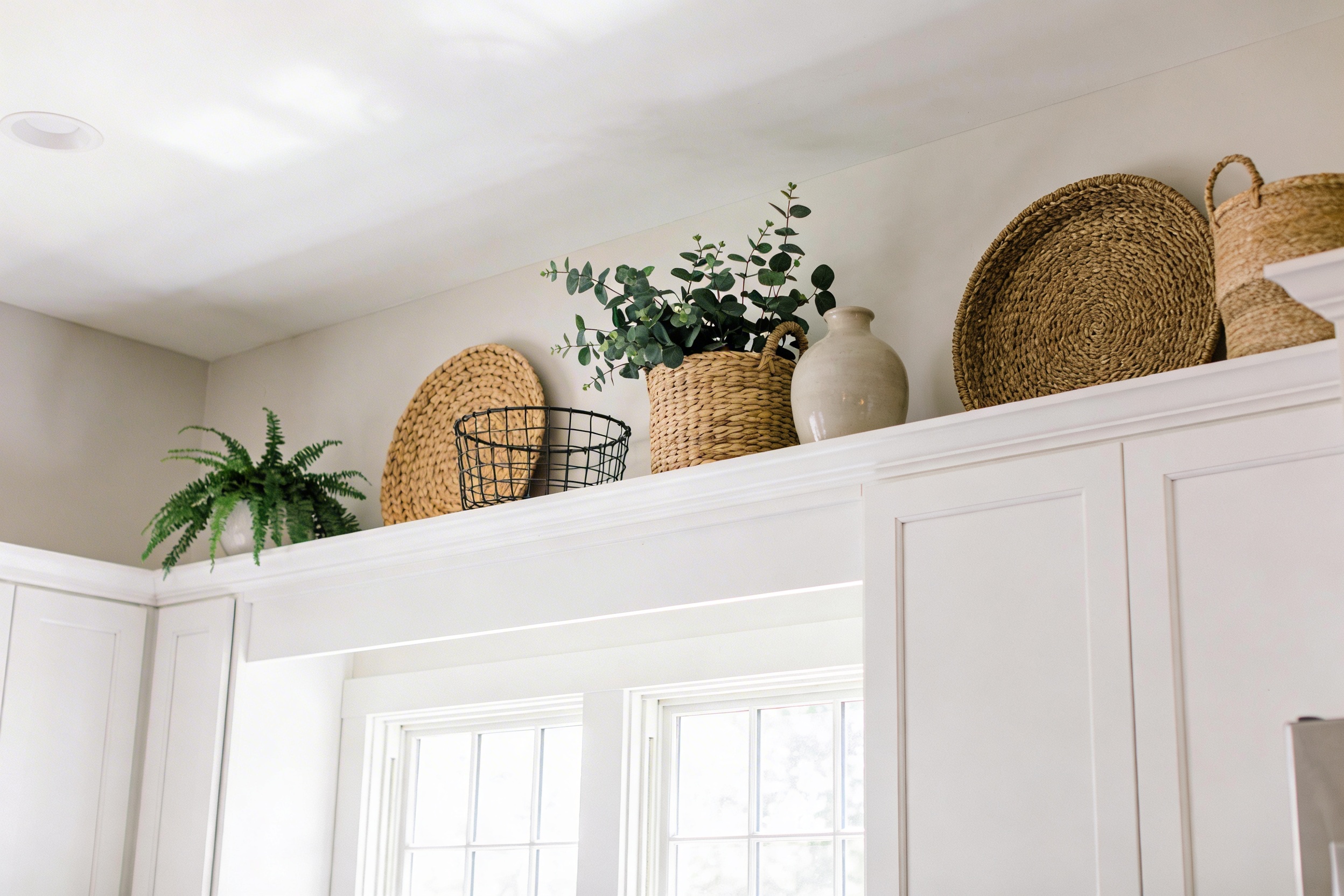 How to Decorate Above Kitchen Cabinets Like a Pro