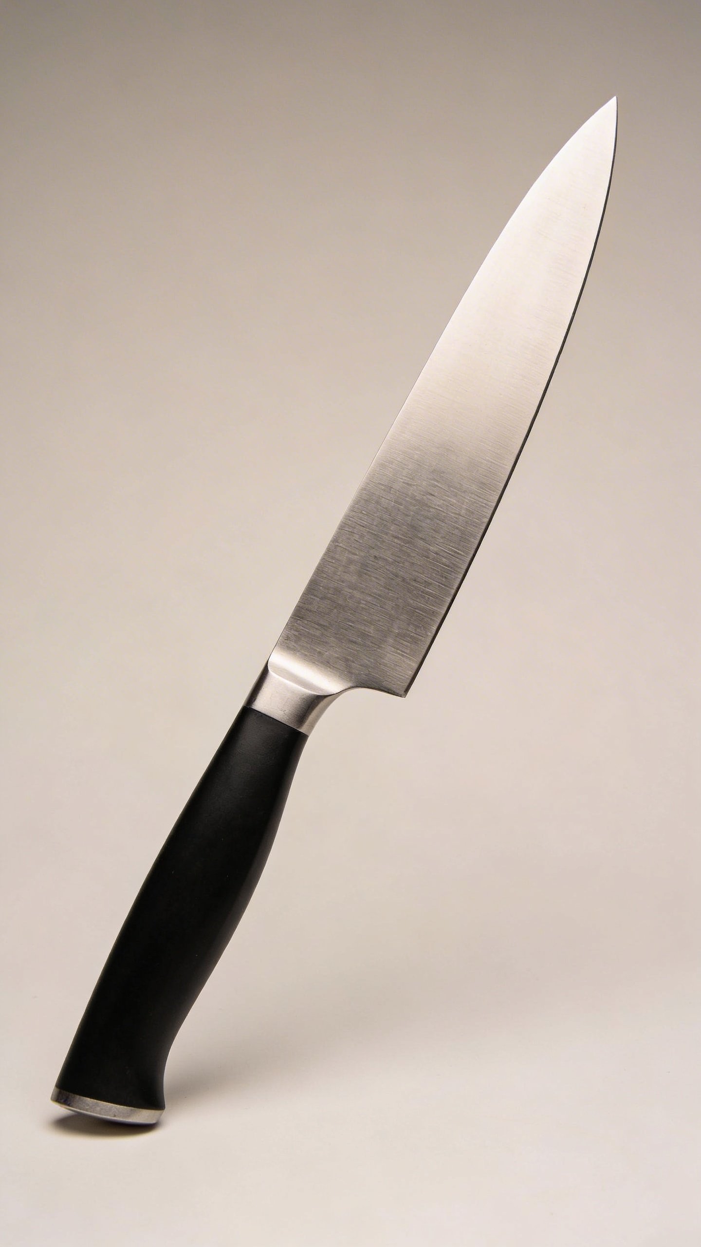 Modern stainless steel kitchen knife with black handle
